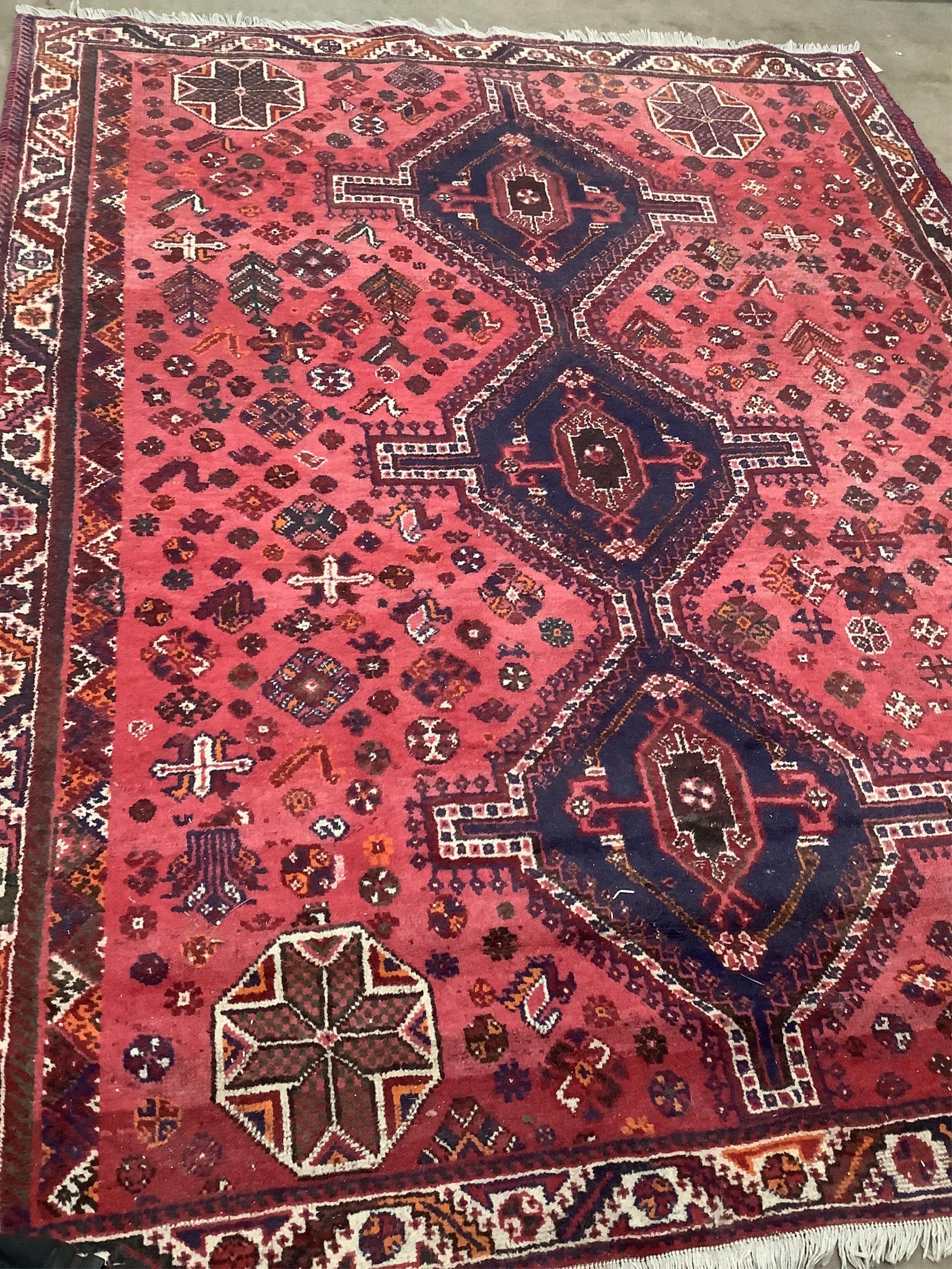 A Hamadan red ground carpet, 270 x 214cm. Condition - fair